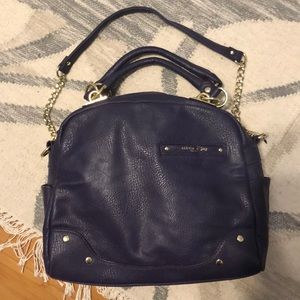 large purple statement purse